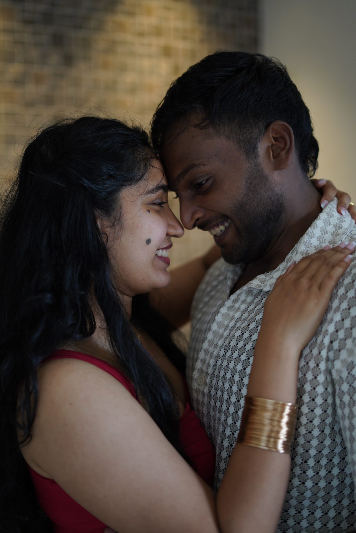 Aster and Chris sharing a quiet, smiling moment